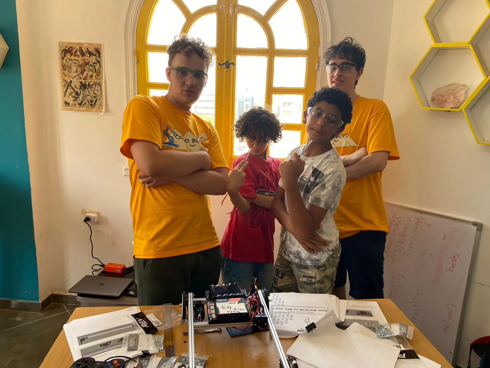 Myself and the teams co-captain at the Cairo STEM school working on FTC robotics kits with our group